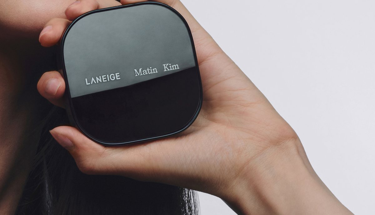 LANEIGE x MATIN KIM compact held in hand (press photo, cropped)